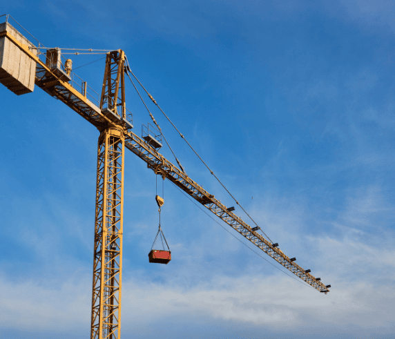 Tower Crane Ticket Perth - Tower crane in operation lifting a load against a clear blue sky during Saferight's Tower Crane operation training